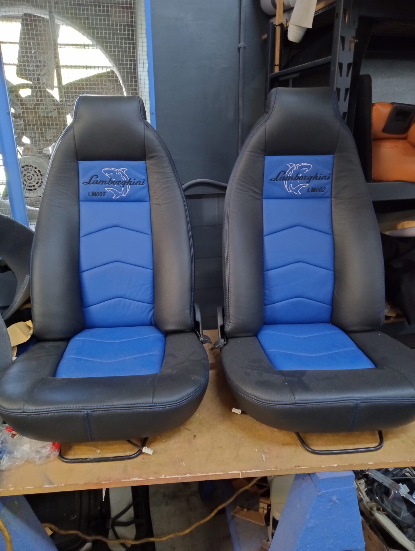 Custom blue upholstered seats