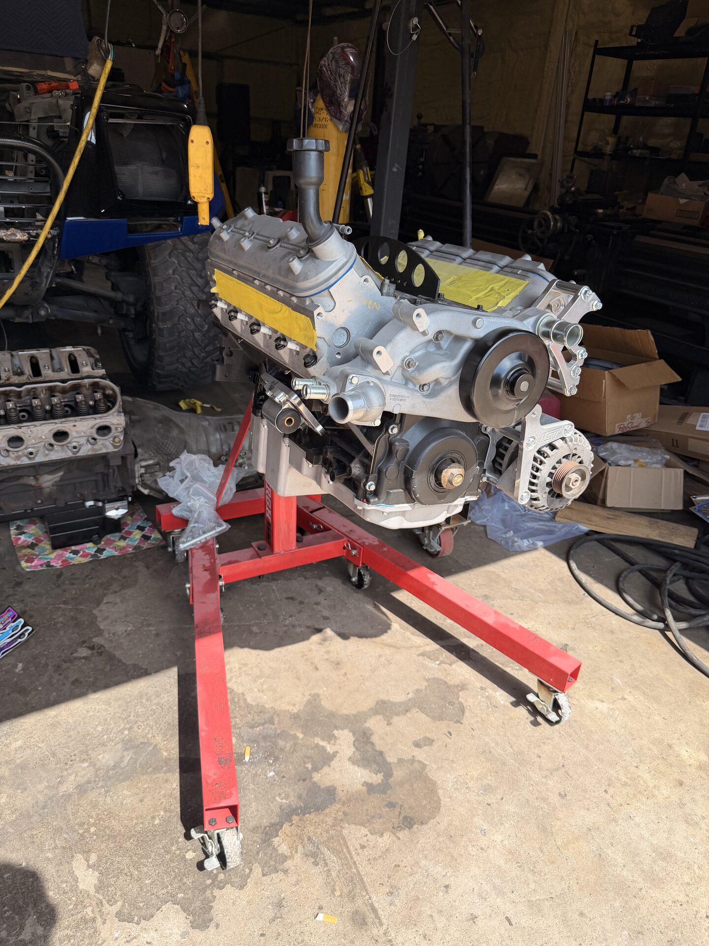 Performance engine assembly on a hoist