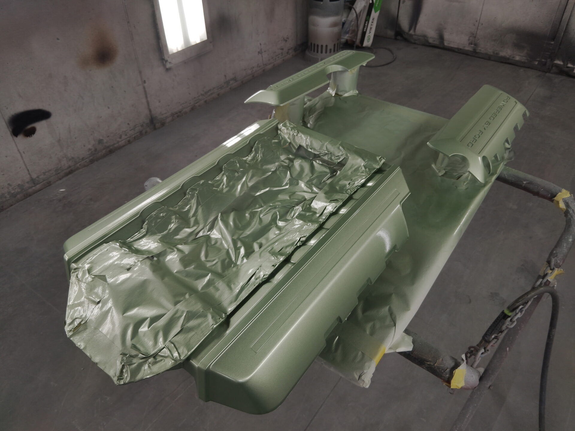 Freshly painted body panels drying