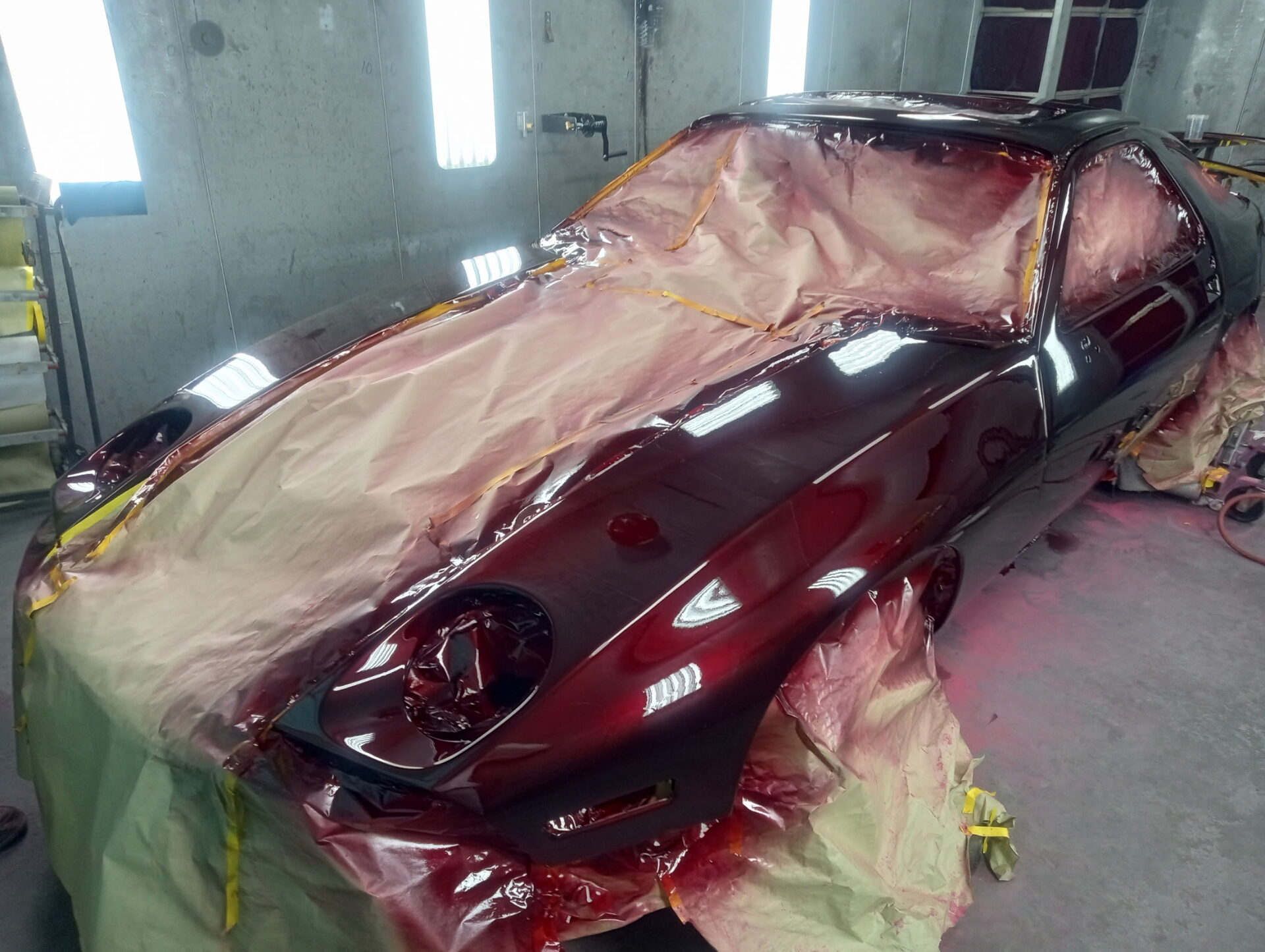 Vehicle masked inside the paint booth